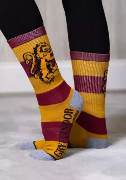 Bioworld Merchandising / Independent Sales Harry Potter Rugby Stripe Gryffindor Crew Socks 7 Bioworld Merchandising / Independent Sales Harry Potter Rugby Stripe Gryffindor Crew Socks -Scary Costumes store harry potter gryffindor rugby strip crew socks alt 3
